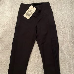 Fabletics Black Leggings. Mesh along side. High waisted capri